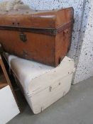 An old tin trunk containing Christmas decorations