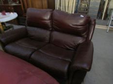 A 2 seat leather reclining sofa
