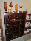 5 shelves of amber glass ware