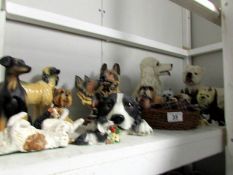 A shelf of various dog figures