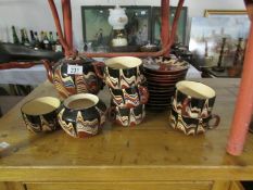 A pottery tea set (some pieces a/f)