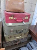 6 old suitcases and a folio case