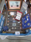 A quantity of collectable coins including framed