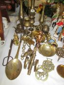 A mixed lot of brass ware