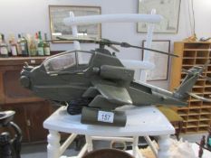 An HM armed forces model helicopter (Action man style)