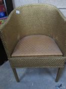 A gold painted loom style chair