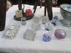A mixed lot of paperweights and ink wells