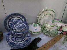 A mixed lot of dinner ware including blue and white
