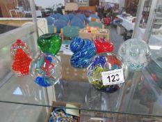 7 glass paperweights