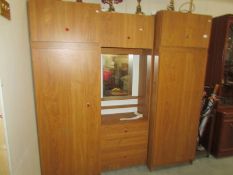 A teak effect combination wardrobe