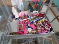 A mixed lot of costume jewellery, pens,