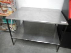 A stainless steel kitchen worktop / table