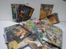 A collection of mainly DC Comics including Hellblazer, Detective Comics, Doom Patrol,