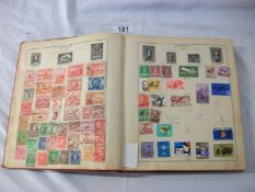 Stamps - A Strand stamp album containing British and World stamps including Victorian