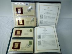 Stamps - 2 albums of The Sumner Collection of 22ct golden replicas of British stamps with first day