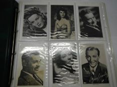 Postcards - An album of approximately 300 postcards including film stars, greeting,