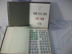 Stamps - An album of American stamps and stock books with approx 2500 stamps
