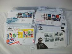 Stamps - An assortment of loose first day covers, commemorative stamps etc
