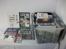 Stamps - Box containing a large quantity of commemorative, presentation, mint and definitive stamps