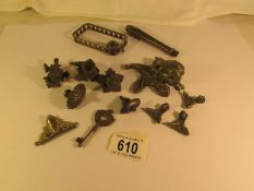 A mixed lot of interesting metal ware including teapot knobs