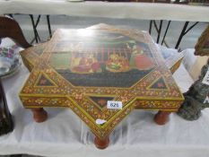 A hand painted Asian table