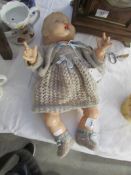 A vintage Rosebud doll