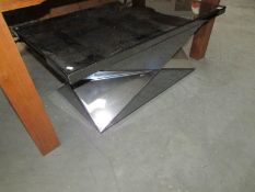 A superb quality ultra modern mirror coffee table