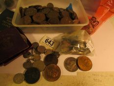 A quantity of British and foreign coins including some silver together with an album of coins