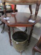 An octagonal mahogany occasional table