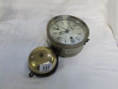 An unusual 8 day Seth Thomas brass and nickel plated wall clock with bell