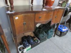 A bow front sideboard