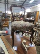 A set of 4 19th century cabriole leg chairs