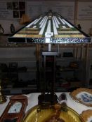A large Tiffany style table lamp