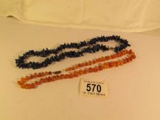 An amber necklace and one other