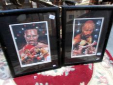 A pair of framed and glazed boxing prints