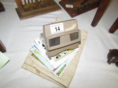 A vintage 3D viewer and cards etc