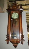 A Victorian mahogany twin weight Vienna wall clock