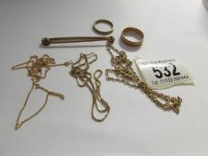 2 9ct gold rings, a 9ct gold safety pin and 3 9ct gold neck chains,