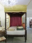 A 19th century four poster bed
