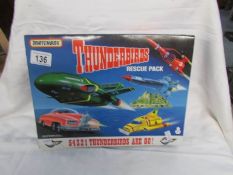 A boxed Match box Thunderbirds rescue pack