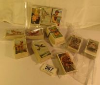 A mixed lot of cigarette cards including some sets
