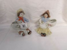 A pair of 19th century match strikers in the form of Dutch Children and clogs