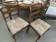 A pair of inlaid chairs