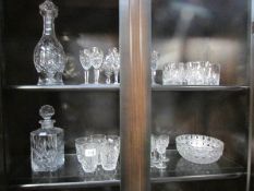 A mixed lot of cut glass including 2 decanters, fruit bowl,