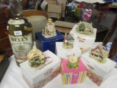 A collection of boxed Lilliput Lane and David Winter cottages including Old Mother Hubbard