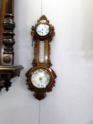A barometer wall clock,