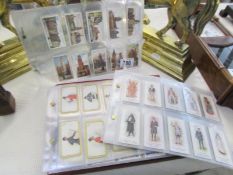 5 sets of cigarette cards and a album