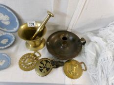 A brass pestle and mortar,