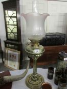A Victorian brass Messenger column oil lamp with later shade