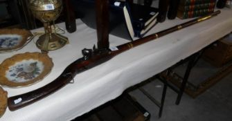 An antique Turkish flintlock rifle